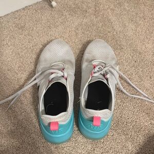 Stylish White and Teal Sneakers with Pink Accents